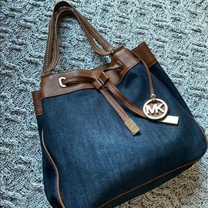 MK Denim and Leather Bucket Bag.
